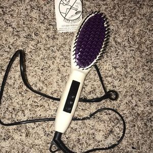 Heated brush hair straightener